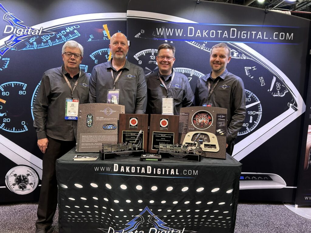 Dakota Digital staff at trade show booth