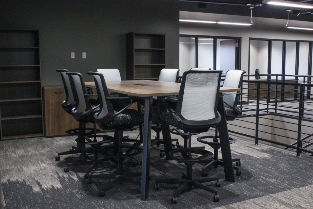 high top table with office chairs